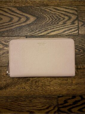 kate spade blush pink zip-around wallet